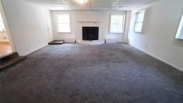 an empty room with windows