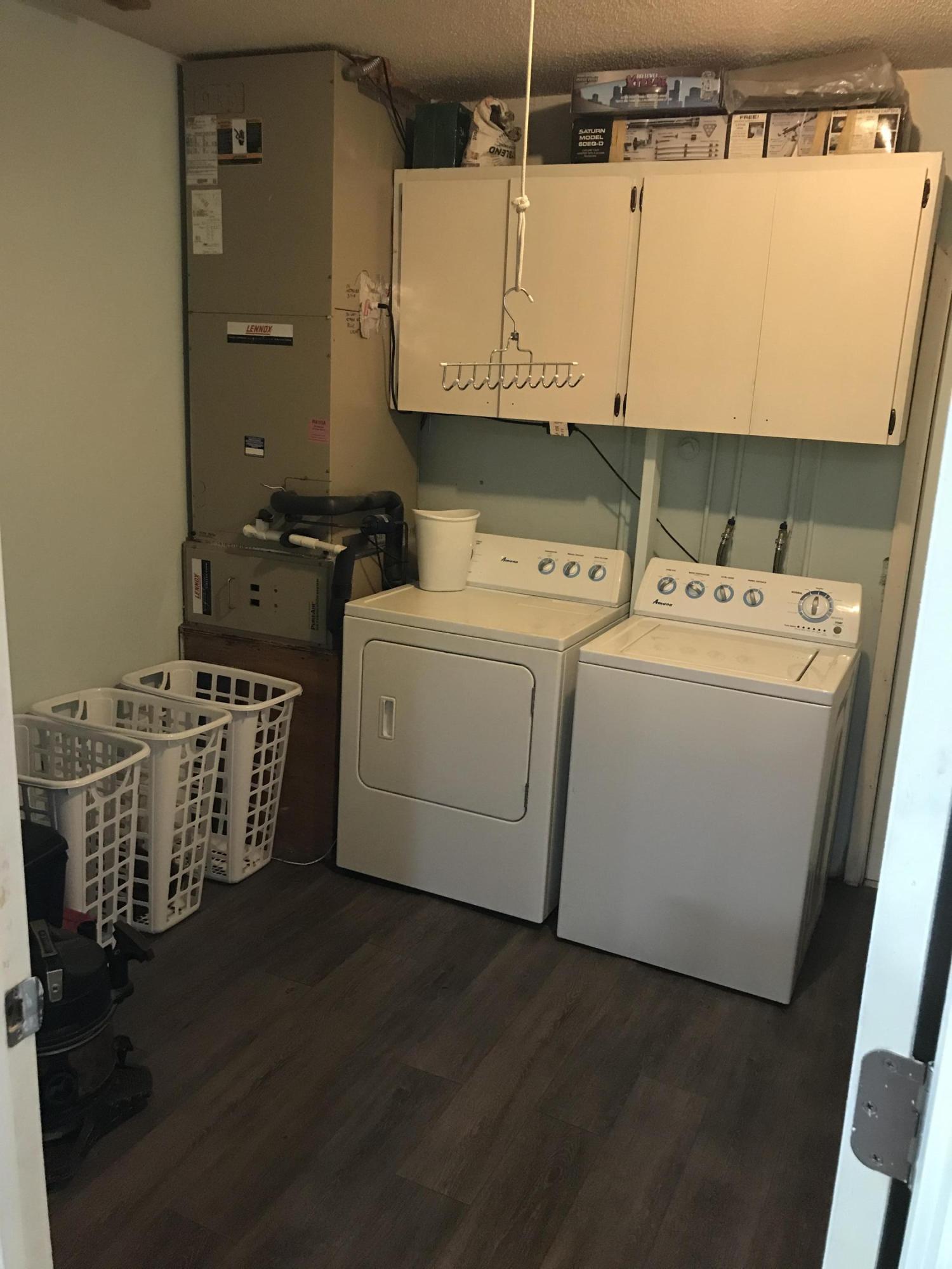 680 Southwest 17th Court Boca Raton, FL 33486 - Photo 16 of 27 a utility room with dryer and washer