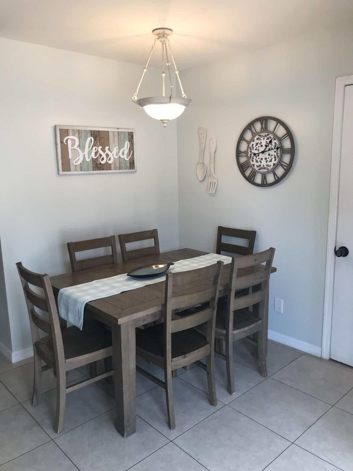 680 Southwest 17th Court Boca Raton, FL 33486 - Photo 20 of 27 a view of a dining room with furniture
