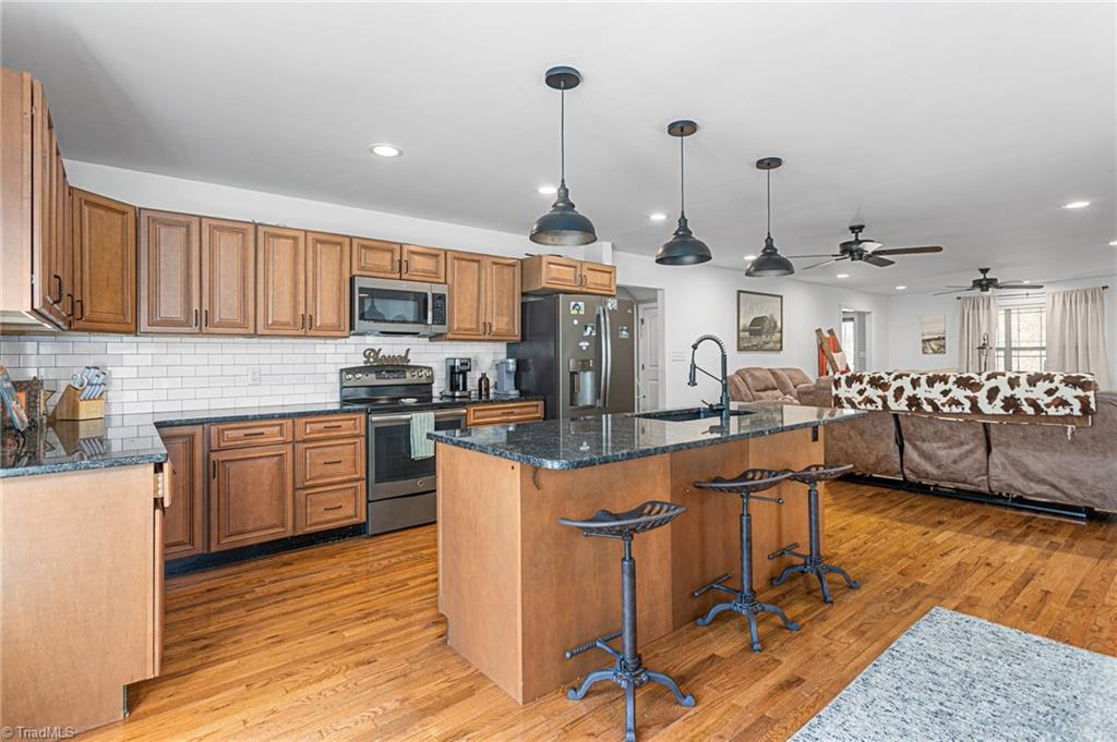 602 Ben Lee Road Thomasville, NC 27360 - Photo 11 of 45 Wood floors through living area
