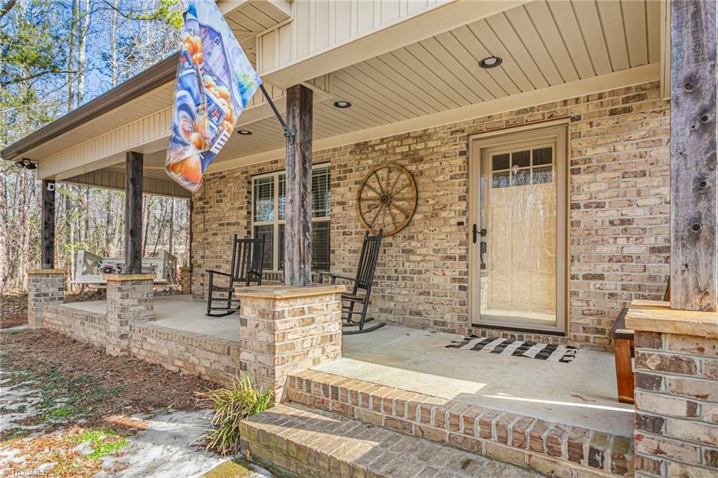 602 Ben Lee Road Thomasville, NC 27360 - Photo 2 of 45 Beautiful rocking chair front porch