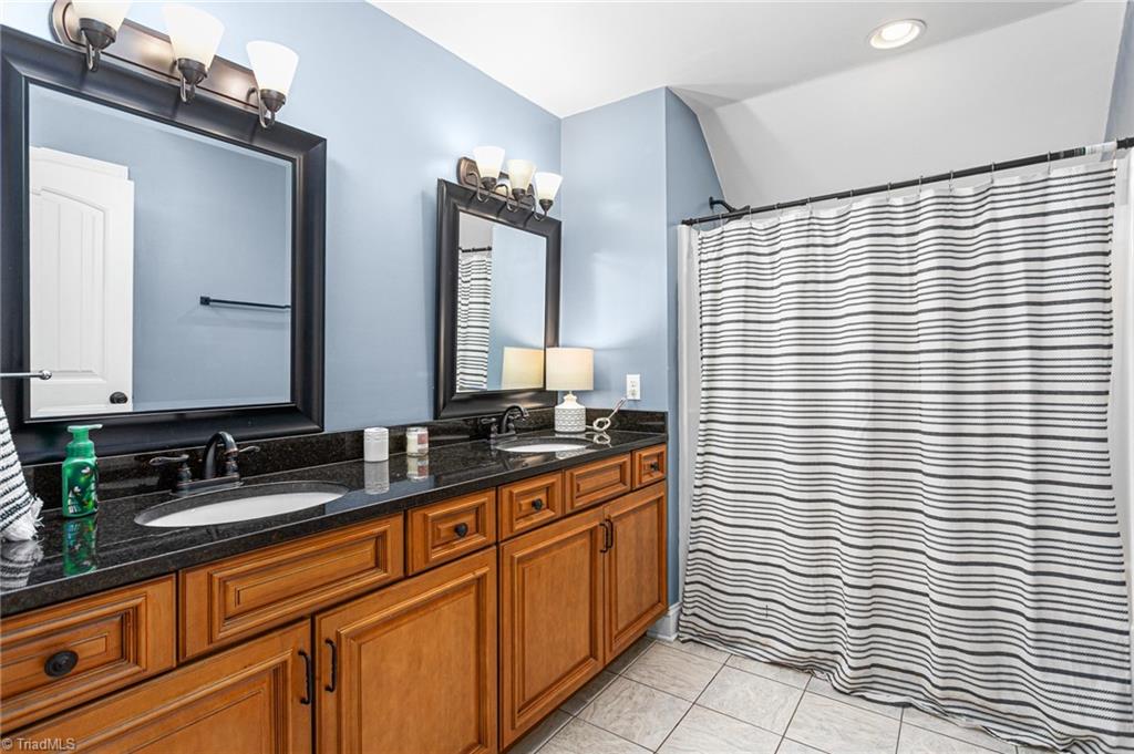 602 Ben Lee Road Thomasville, NC 27360 - Photo 25 of 45 Large second bath upstairs with bedrooms
