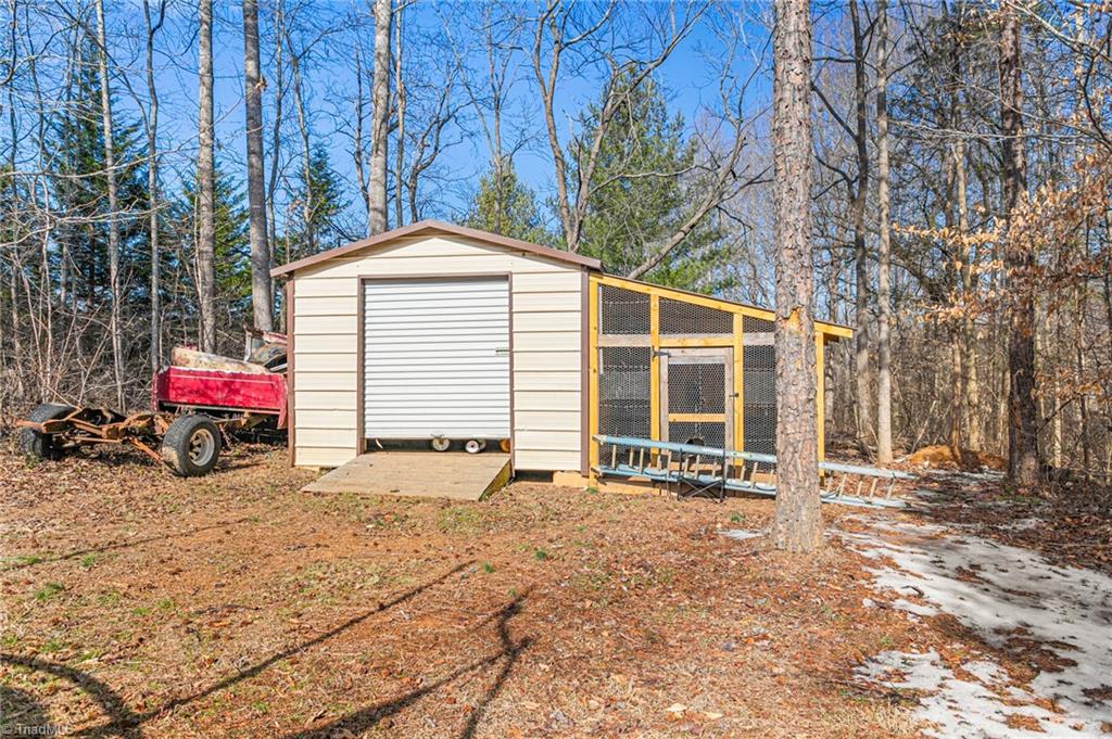 602 Ben Lee Road Thomasville, NC 27360 - Photo 31 of 45 Storage building with chicken coop