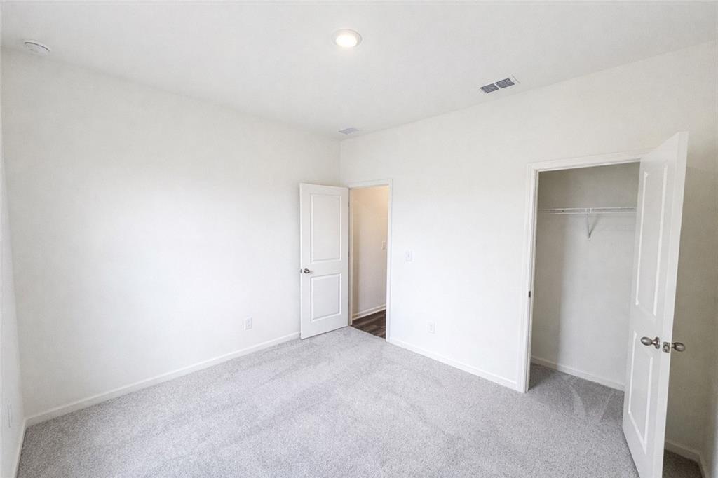 44 Rowlett Place Winder, GA 30680 - Photo 11 of 47 a view of an empty room