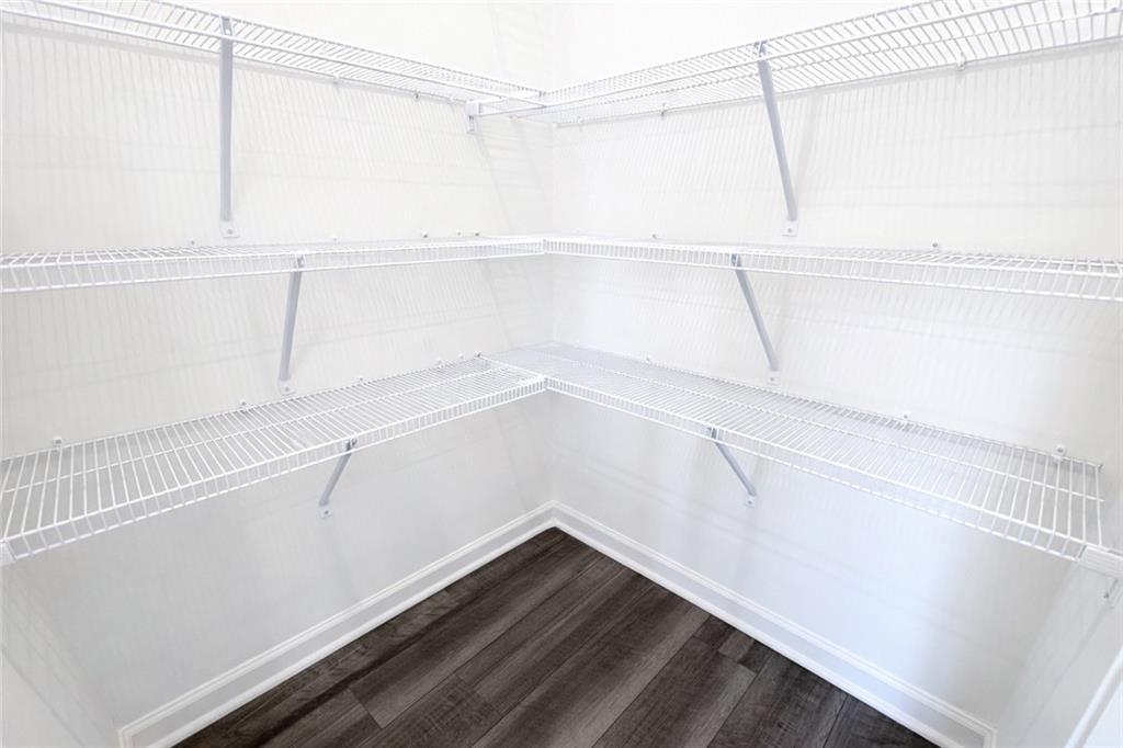 44 Rowlett Place Winder, GA 30680 - Photo 8 of 47 a view of an empty walk in closet