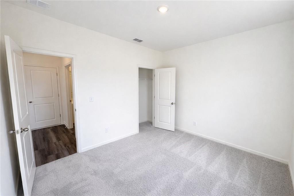 44 Rowlett Place Winder, GA 30680 - Photo 10 of 47 a view of an empty room