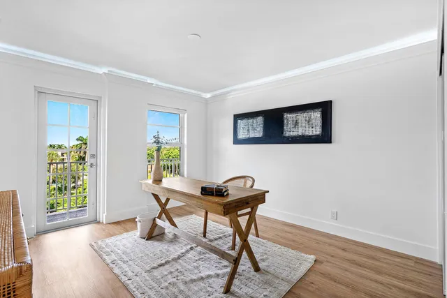 a workspace with furniture and a window