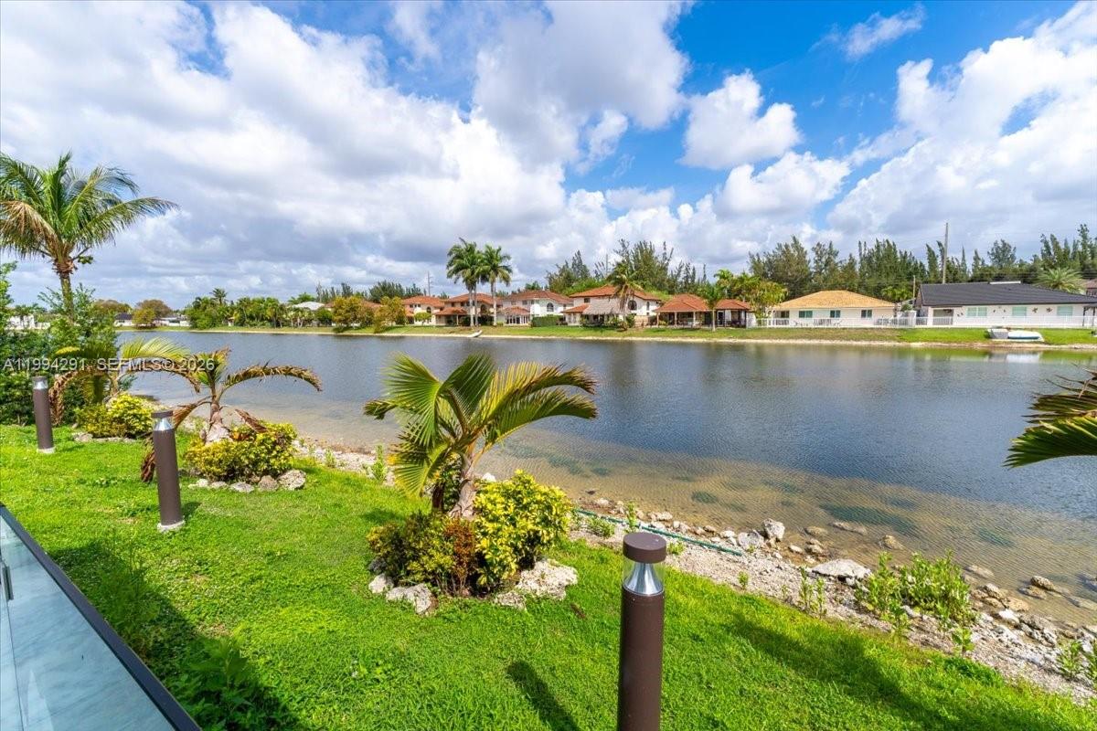 15763 Southwest 43rd Street Miami, FL 33185 - Photo 38 of 46 a view of a lake with a city