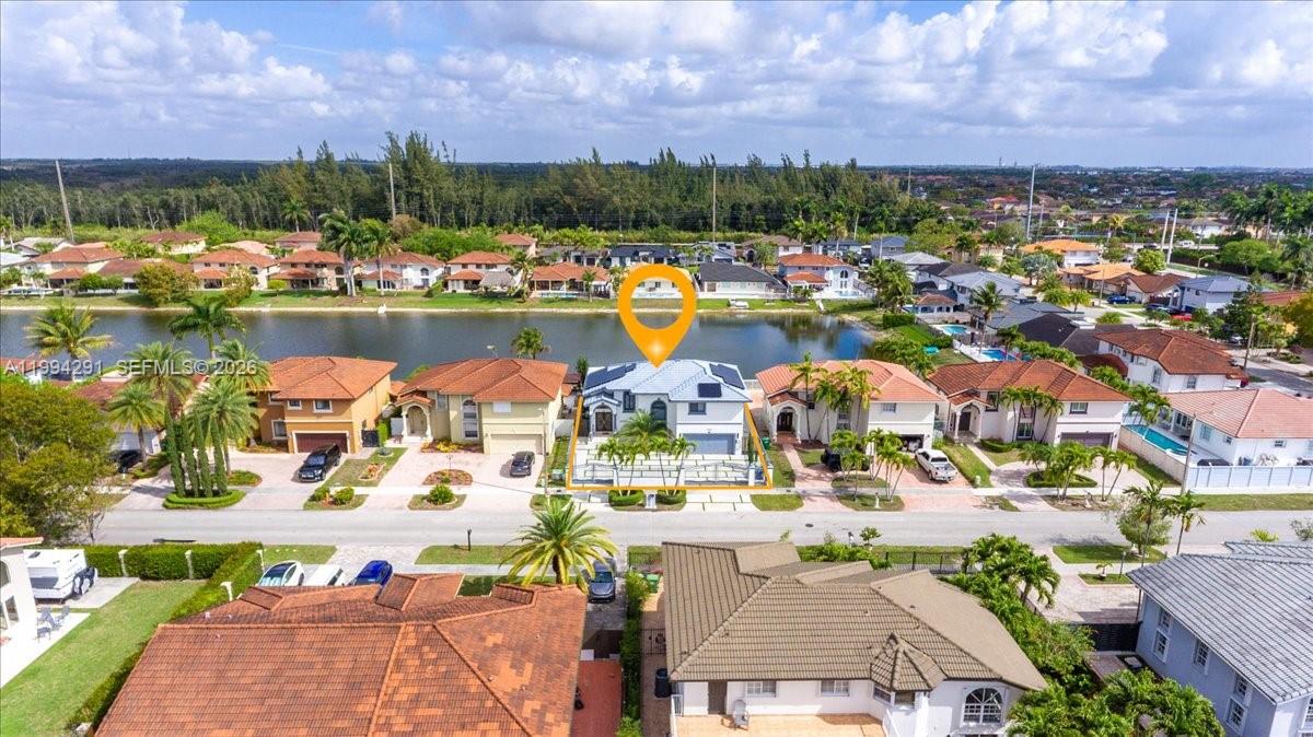 15763 Southwest 43rd Street Miami, FL 33185 - Photo 43 of 46 a view of a lake with a city