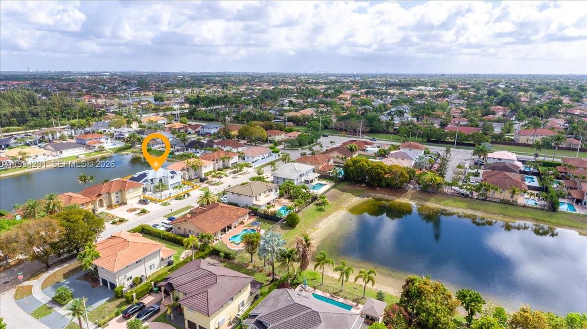 15763 Southwest 43rd Street Miami, FL 33185 - Photo 44 of 46 an aerial view of residential houses with outdoor space