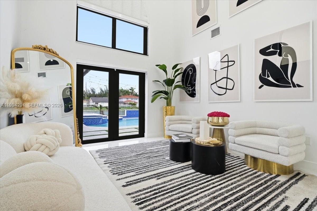 15763 Southwest 43rd Street Miami, FL 33185 - Photo 8 of 46 a living room with a couch and dresser