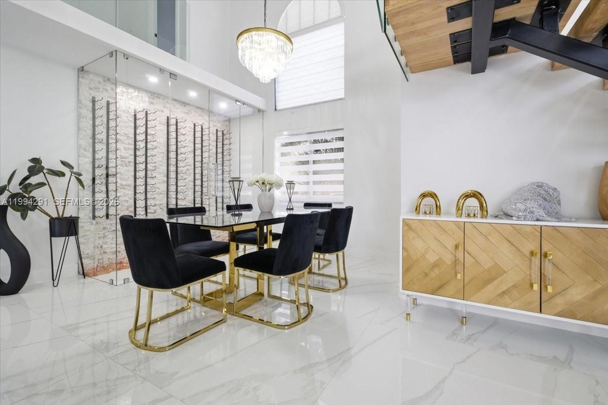 15763 Southwest 43rd Street Miami, FL 33185 - Photo 9 of 46 a view of a dining room with furniture