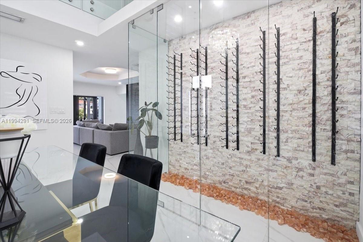 15763 Southwest 43rd Street Miami, FL 33185 - Photo 10 of 46 a living room with furniture and a large window