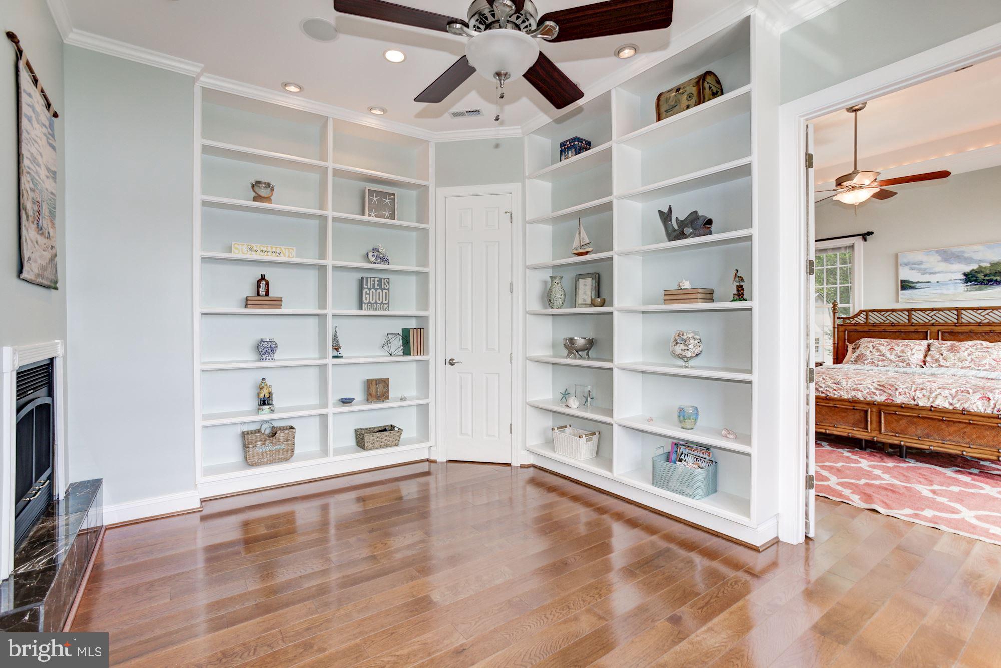 275 Beach Road Pasadena, MD 21122 - Photo 21 of 70 Office with custom shelving & dual-sided fireplace