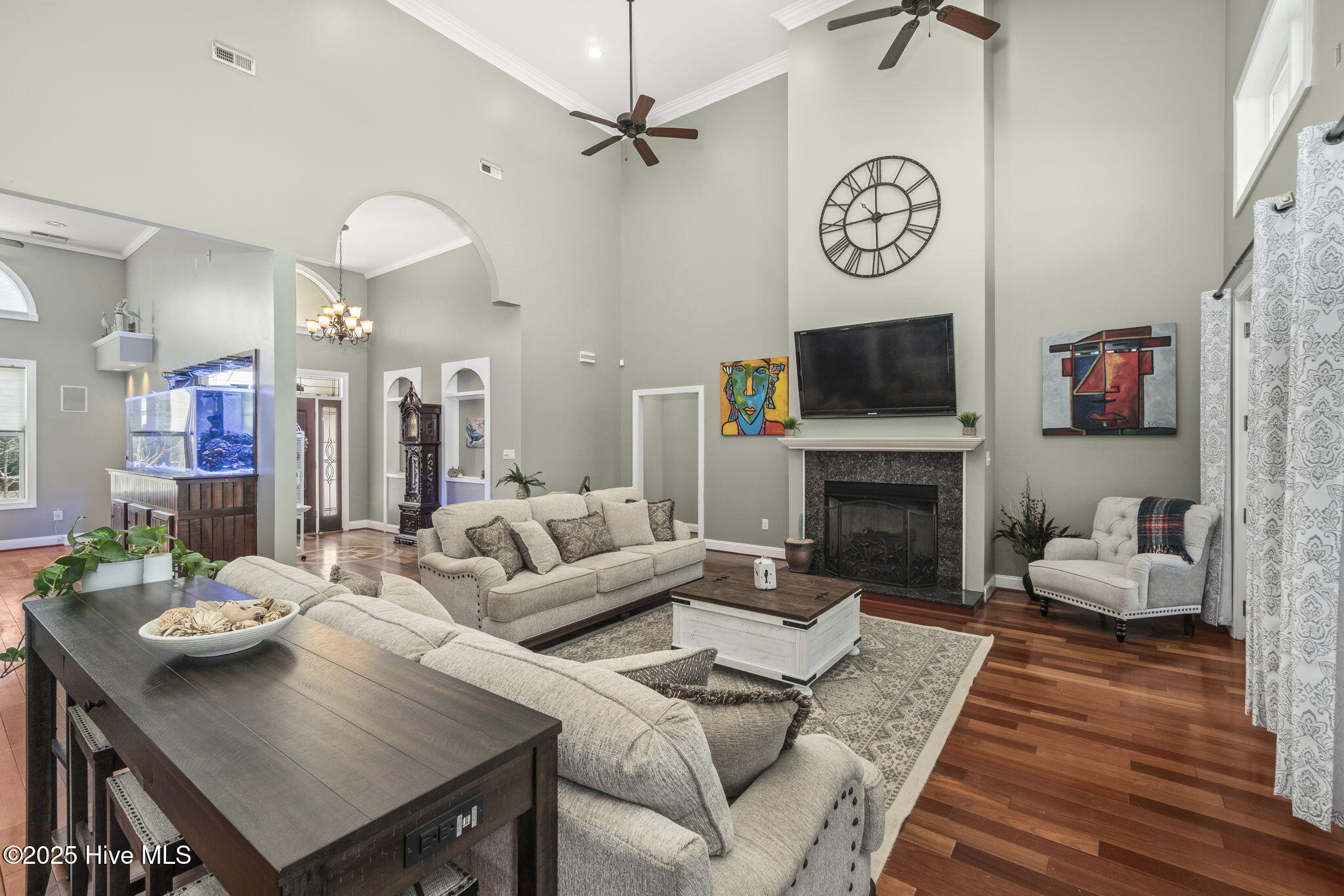 955 Becton Road Havelock, NC 28532 - Photo 16 of 57 LIving room w/ fireplace and great views