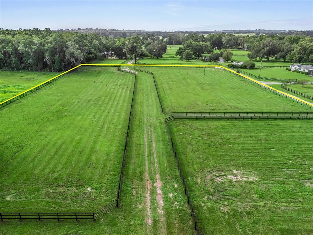 Northwest 100th Ocala, FL 34482 - Photo 7 of 17 a view of a golf ground with large trees