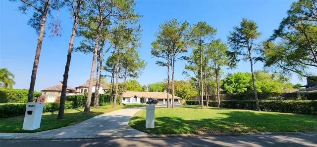 a view of a playground with basketball court