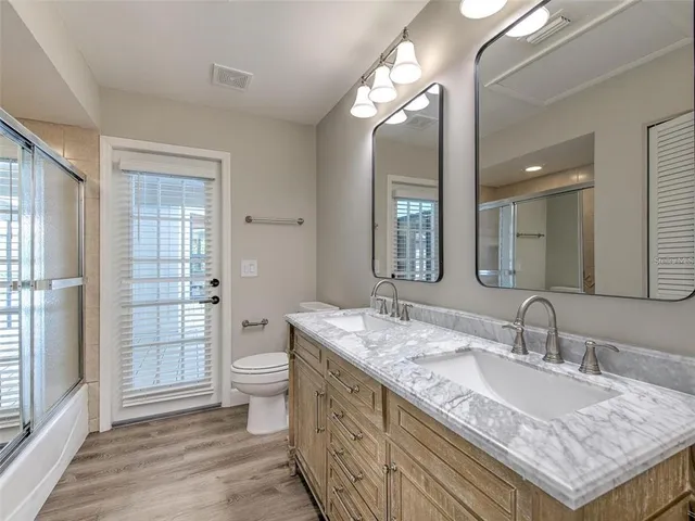 a view of a bedroom from a hallway