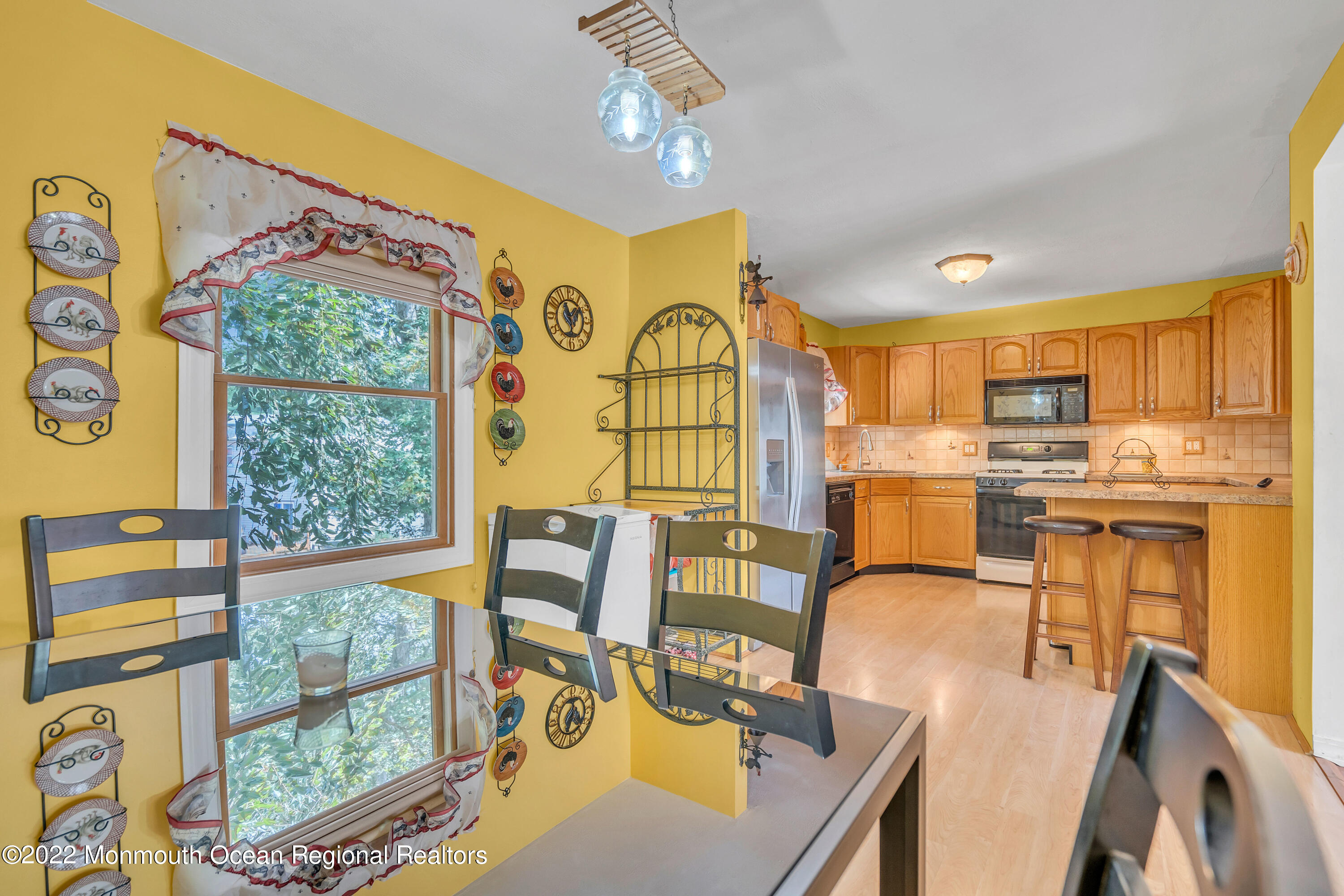 148 Weldon Road Manchester Township, NJ 08759 - Photo 14 of 36 a view of a dining room with furniture window and outside view