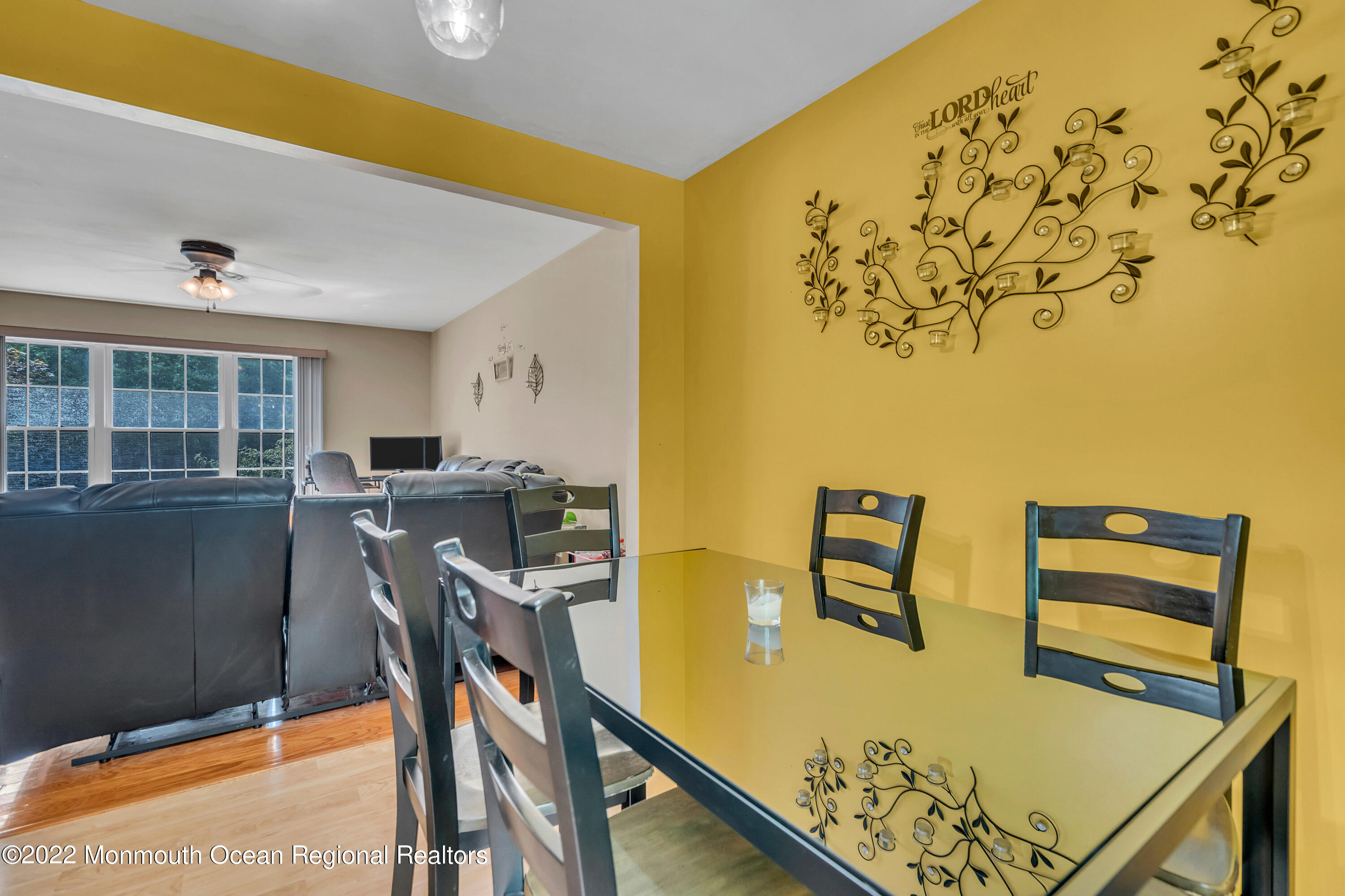 148 Weldon Road Manchester Township, NJ 08759 - Photo 16 of 36 a view of a dining room with furniture and a window