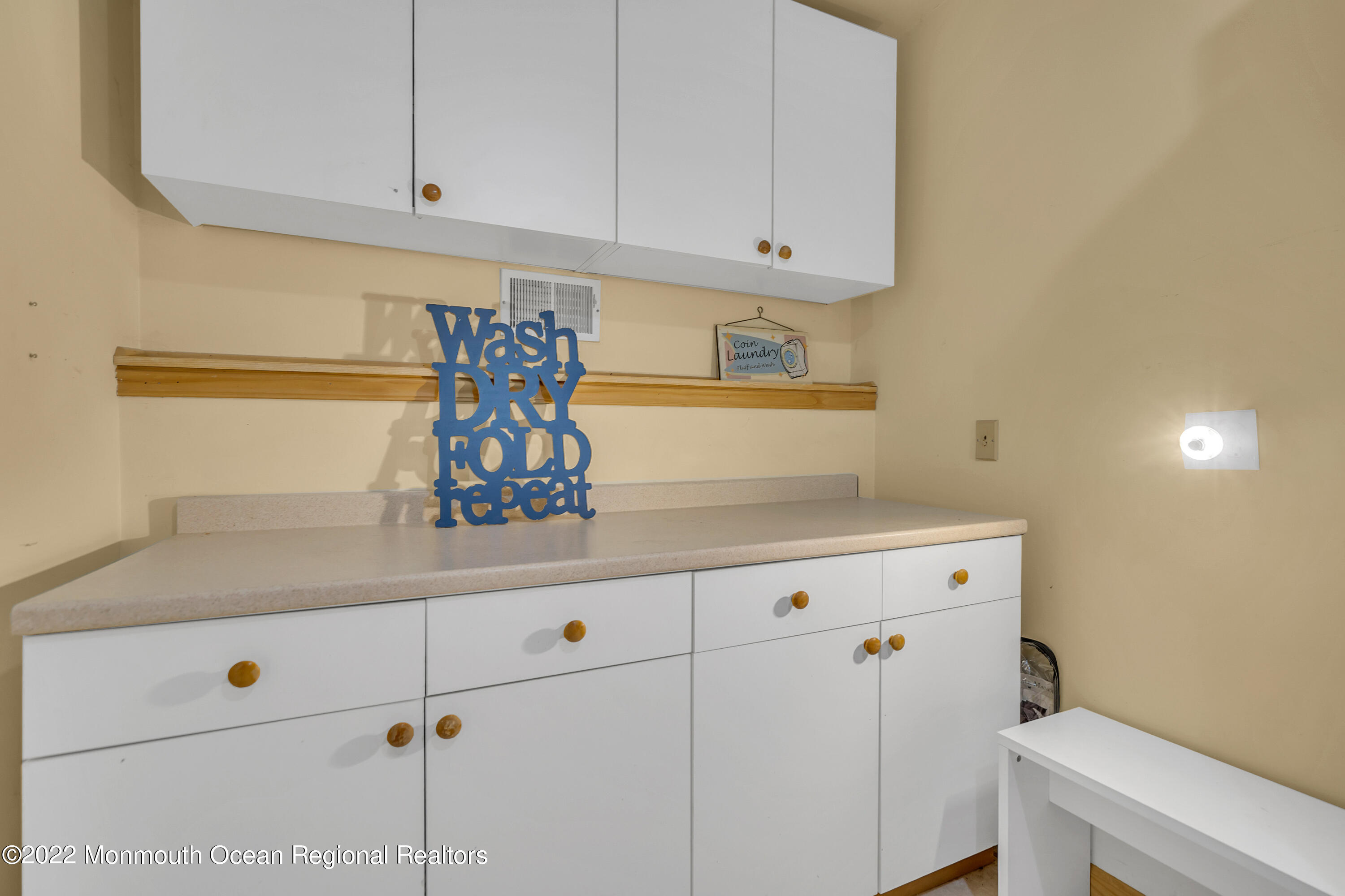 148 Weldon Road Manchester Township, NJ 08759 - Photo 24 of 36 a kitchen with granite countertop white cabinets and white appliances