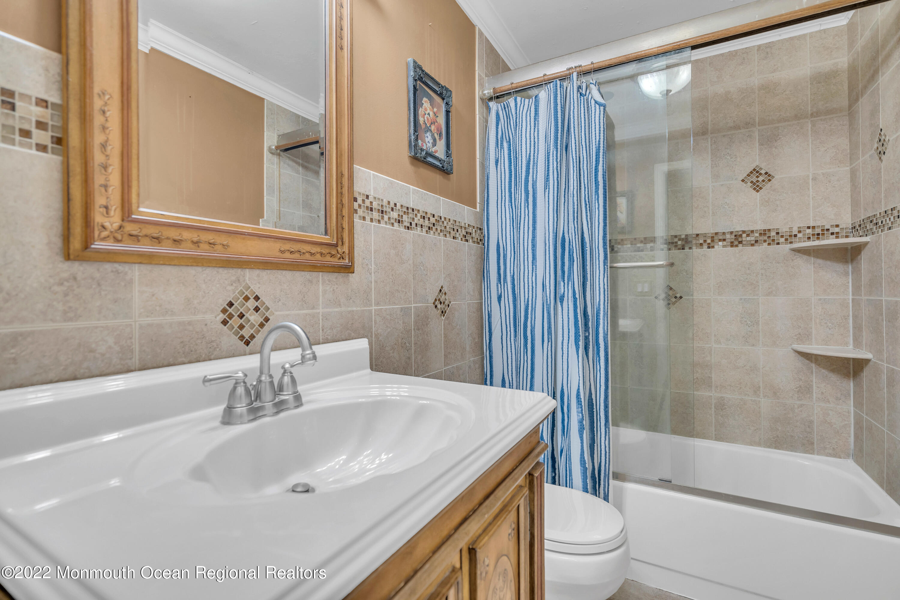 148 Weldon Road Manchester Township, NJ 08759 - Photo 25 of 36 a bathroom with a sink toilet and shower