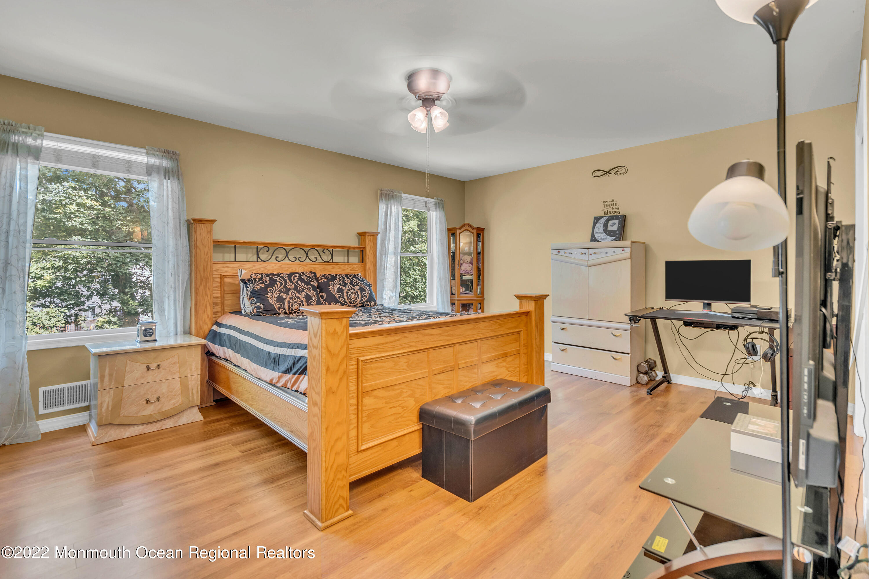 148 Weldon Road Manchester Township, NJ 08759 - Photo 27 of 36 a bed room with a bed and a chair