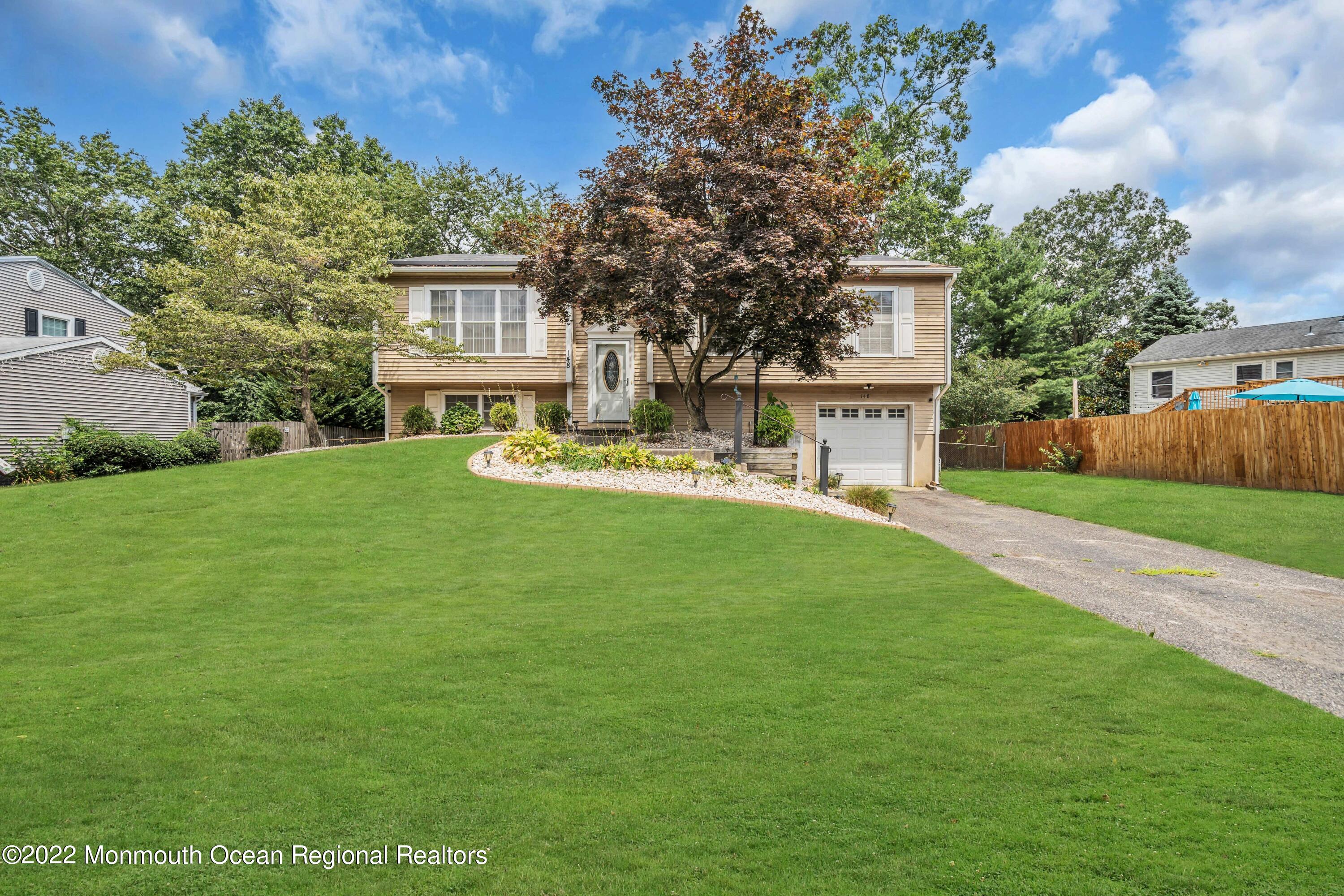 148 Weldon Road Manchester Township, NJ 08759 - Photo 4 of 36 a view of a house with a yard