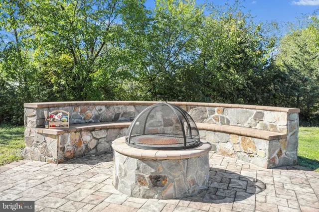 a bedroom with a large bed and a couch