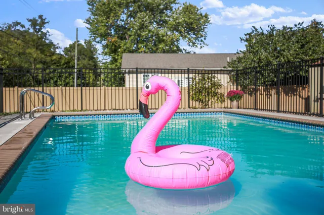 a backyard of a house with a swimming pool