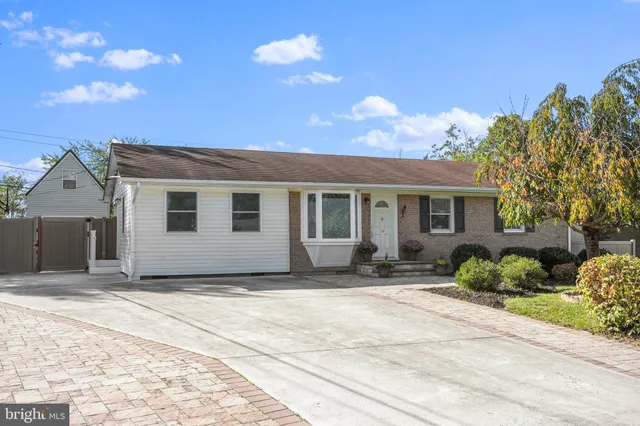 a house with yard in front of it