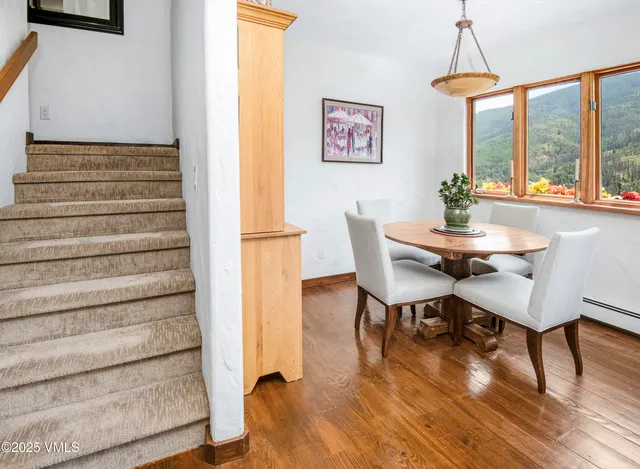 a bedroom with a large bed and a dresser