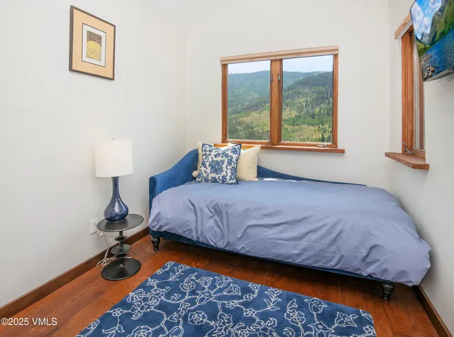 a view of a kitchen from the hallway