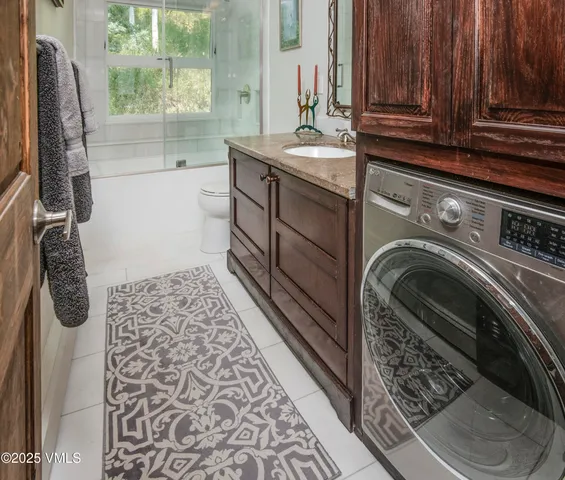 a view of a patio with furniture and a potted plants