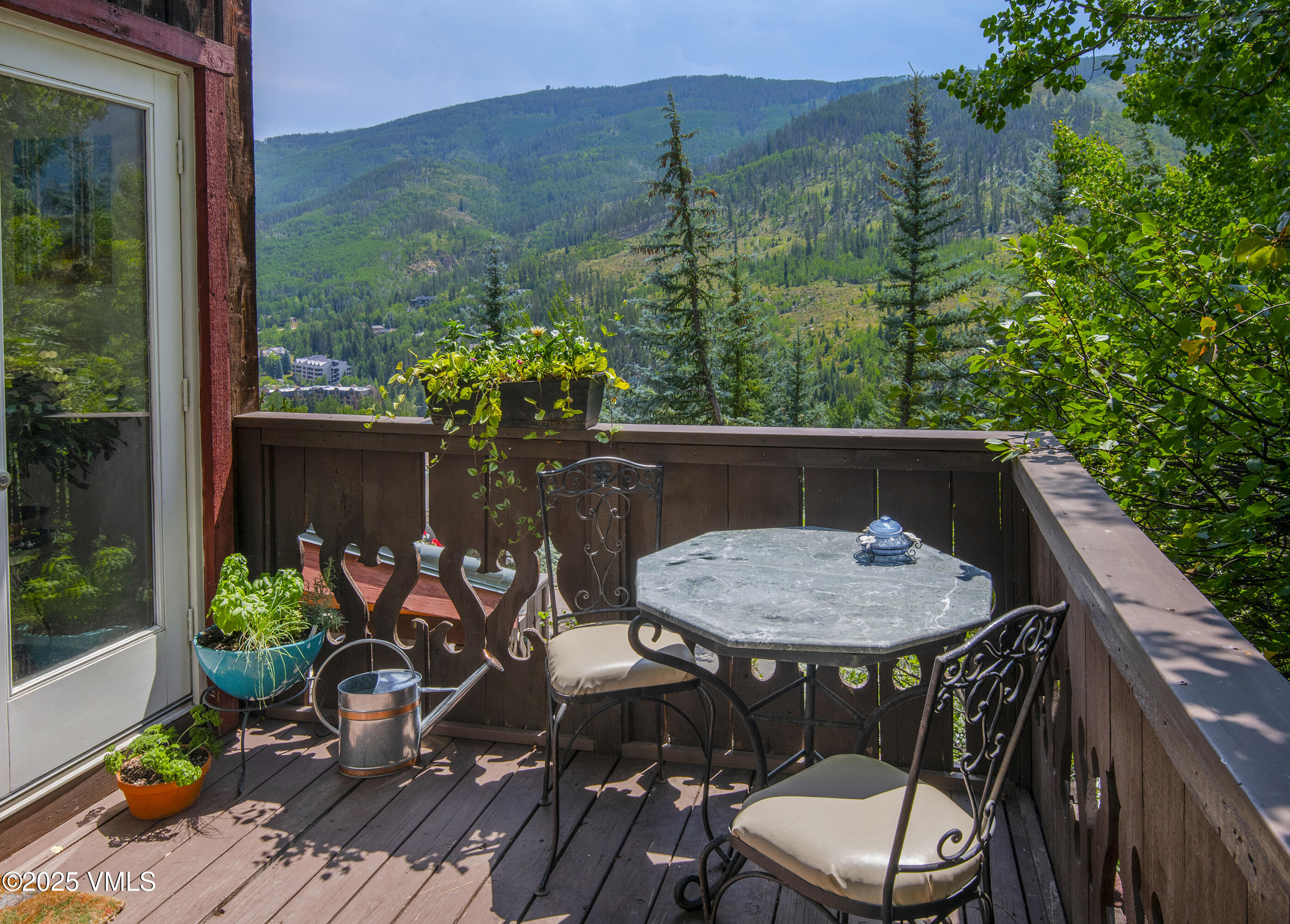 2653 Cortina Lane, Unit 5A Vail, CO 81657 - Photo 3 of 39 a view of a chairs and table in the patio