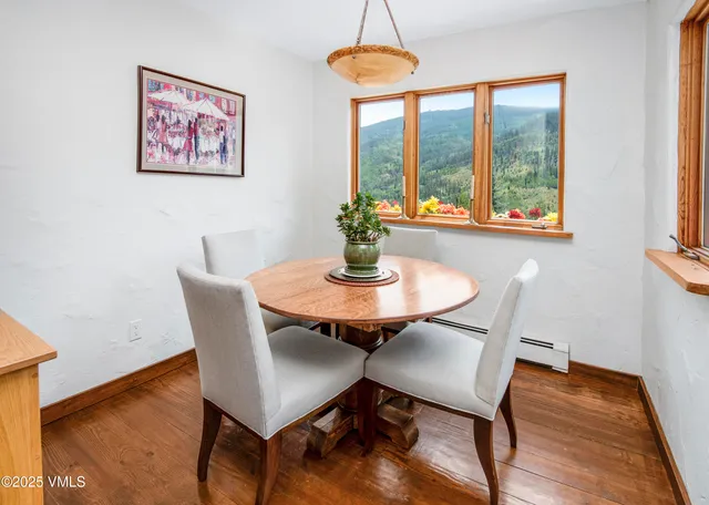 a bathroom with a sink a toilet and a shower