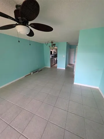 a view of a livingroom and a window