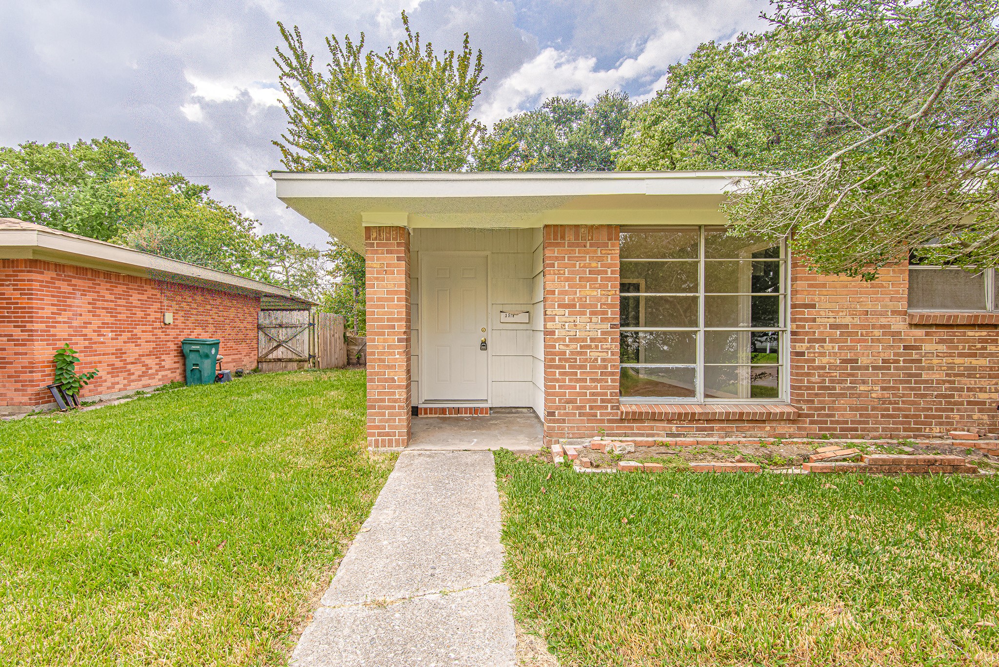 3518 Mattye Maye Drive Pasadena, TX 77503 - Photo 3 of 21 front view of a house with a yard