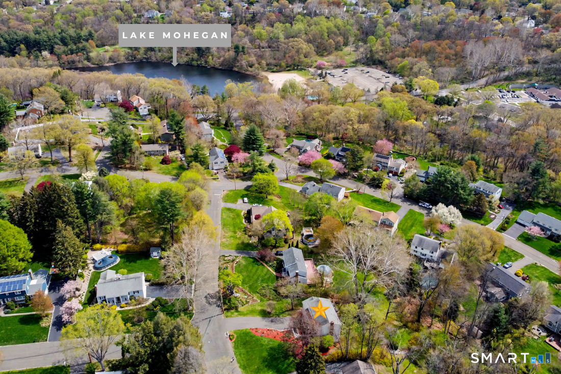 370 Nepas Road Fairfield, CT 06825 - Photo 25 of 32 a view of a lake with lots of residential buildings