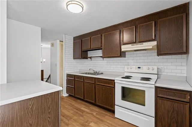 a utility room with washer and dryer