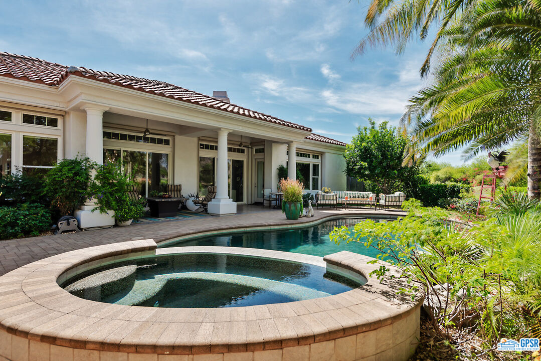 53 Vista Encantada Rancho Mirage, CA 92270 - Photo 24 of 33 a view of swimming pool with outdoor seating and plants