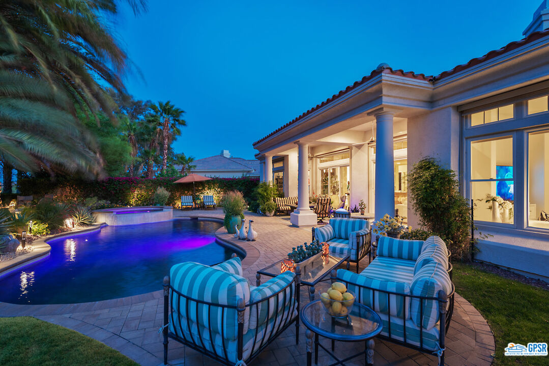 53 Vista Encantada Rancho Mirage, CA 92270 - Photo 27 of 33 a view of an chairs and tables in the patio