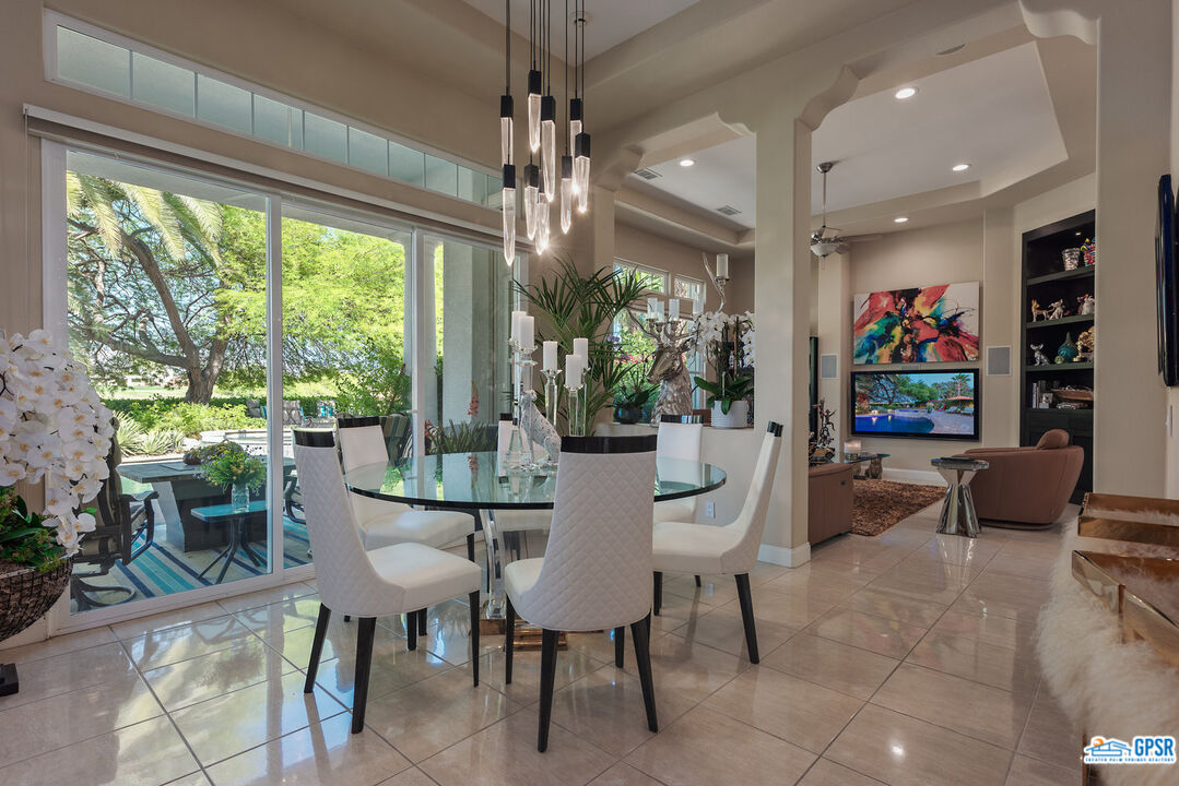 53 Vista Encantada Rancho Mirage, CA 92270 - Photo 6 of 33 a view of a dining room with furniture window and outside view