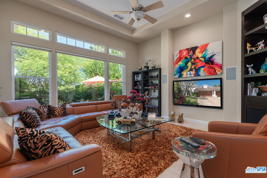 53 Vista Encantada Rancho Mirage, CA 92270 - Photo 8 of 33 a living room with furniture and a large window