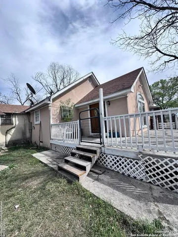 a view of balcony with wooden floor