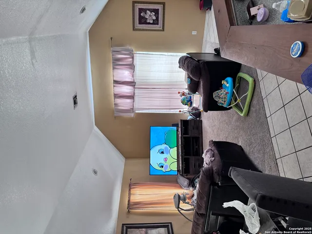 a view of staircase with a fireplace