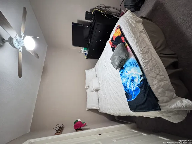 a living room with furniture and flat screen tv