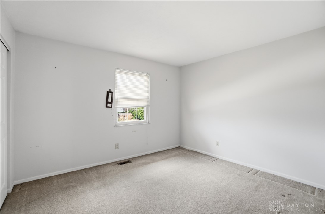 9964 Hummingbird Way Dayton, OH 45458 - Photo 40 of 57 Bright and airy, this room provides a blank canvas for personalization.