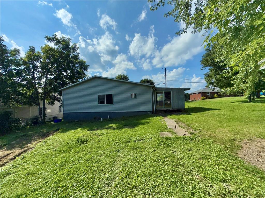 304 Narrows Road Connellsville, PA 15425 - Photo 5 of 13 a front view of house with yard and green space