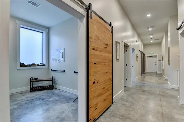 a kitchen with cabinets and a stove